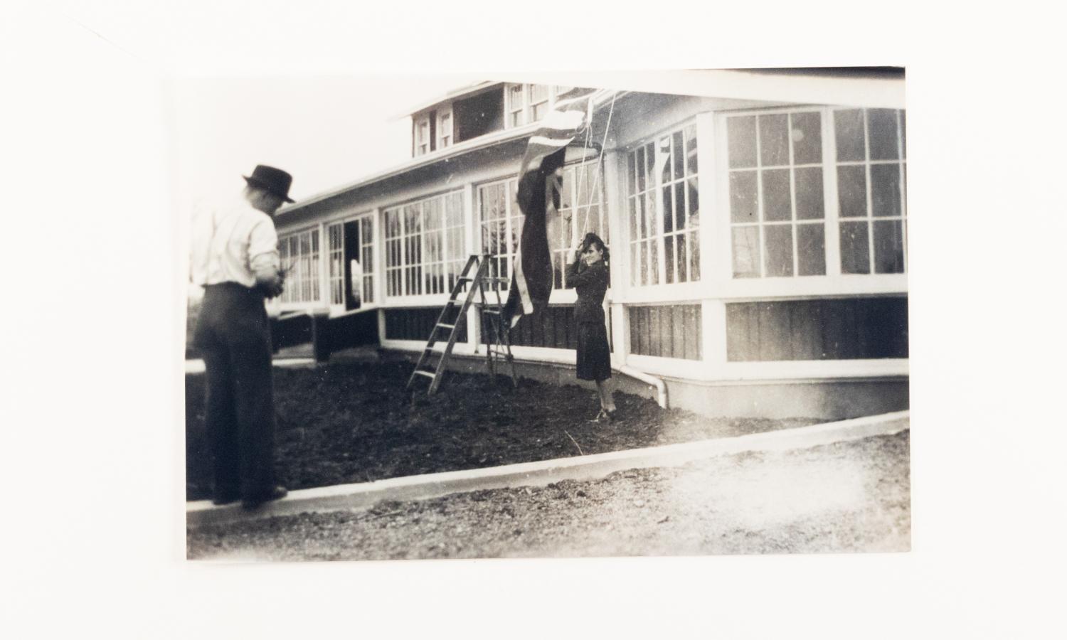  Raising the flag, Riverview Hotel, 1940s