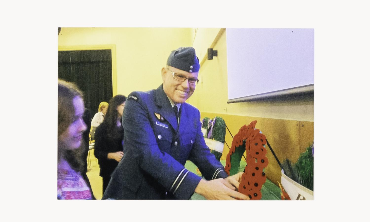 Airman placing wreath