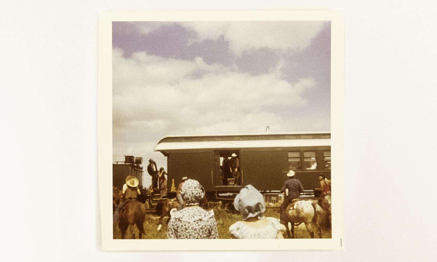 he train was carrying a gold bullion shipment. The women were out in their finest Sunday best and waiting to welcome the many guests to an event. 