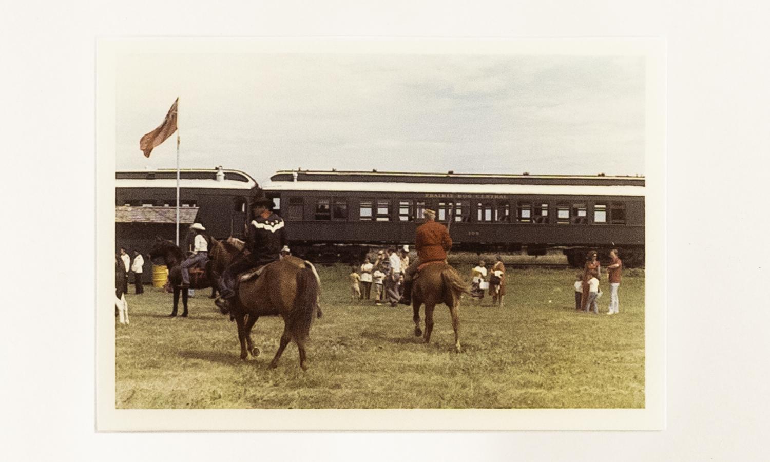 The passengers left the train while the Mounties went to work to get their men. 