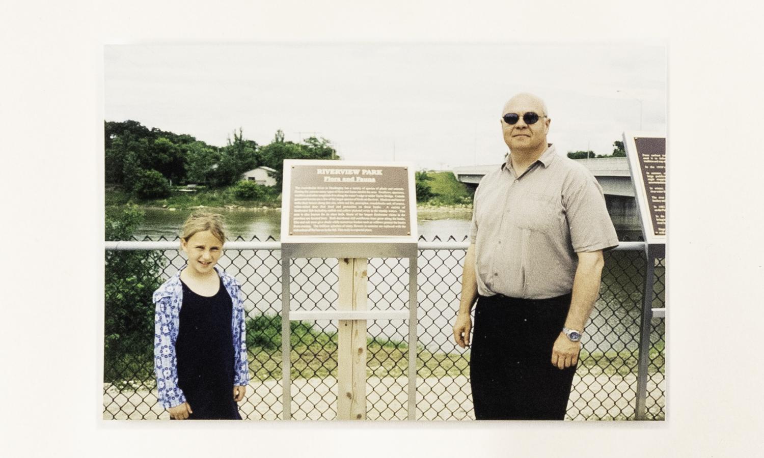 Pheonix Student Rep. and Dennis Peterson, principal plaque unveiling by Pheonix School