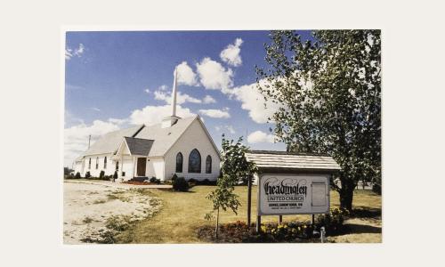 1991, basement expanded for space and furnace. Back of sanctuary was removed and space added to the sanctuary. Reception area added with new entry way into church as it stands today. (changed to end)