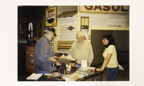 Jim Pearn and Georgia Taillieu help Richard getting everything sorted for the general store. 